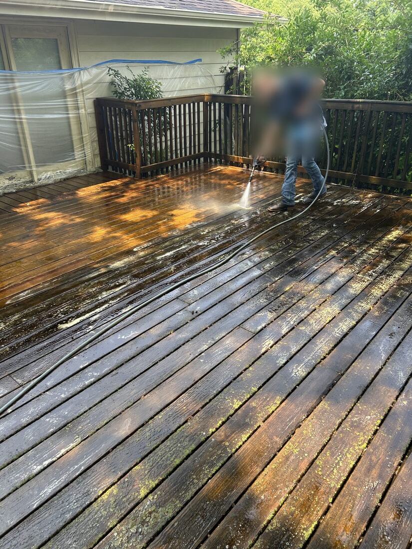 Deck restoration: brightened wood coming back