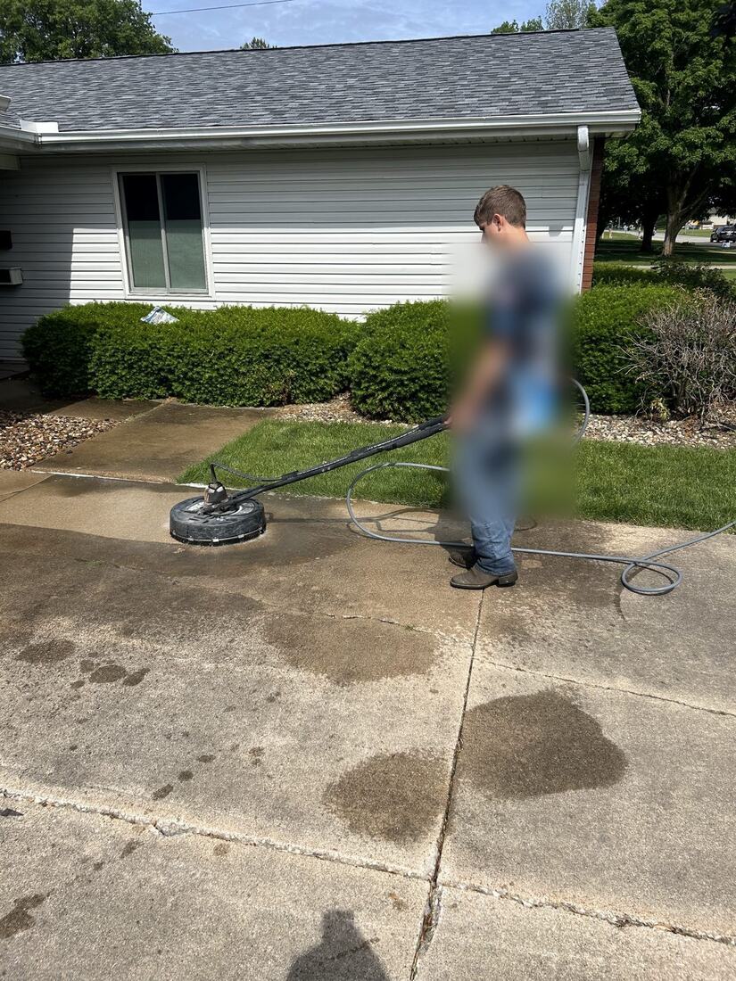 Driveway pressure washing with a surface cleaner